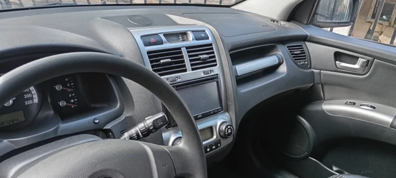 Kia Sportage, снимка 13 - Автомобили и джипове - 53120764