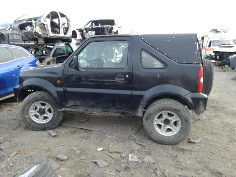 Suzuki Jimny 1.3i, снимка 7 - Автомобили и джипове - 32046266