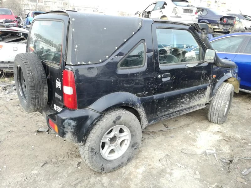 Suzuki Jimny 1.3i, снимка 3 - Автомобили и джипове - 32046266