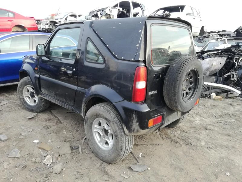 Suzuki Jimny 1.3i, снимка 6 - Автомобили и джипове - 32046266