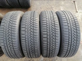 Гуми Зимни 215/65R17, снимка 2 - Гуми и джанти - 38726353