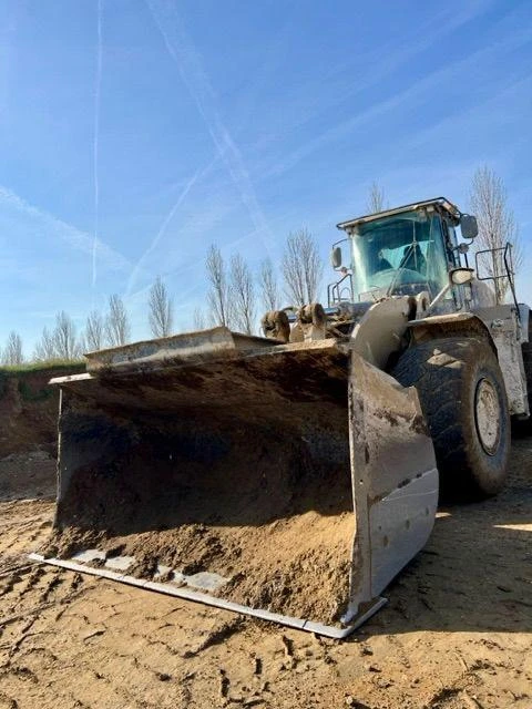 Телескопични товарачи Cat 980K - изображение 10