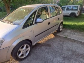 Opel Meriva 1.8 125кс Газ, снимка 10