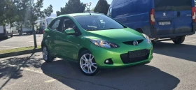 ������ Mazda 2