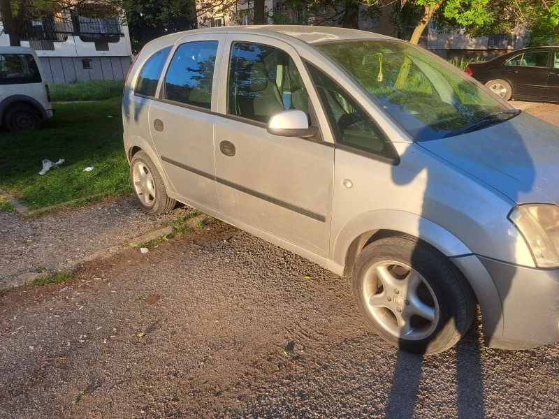 Opel Meriva 1.8 125кс Газ, снимка 11 - Автомобили и джипове - 47234637