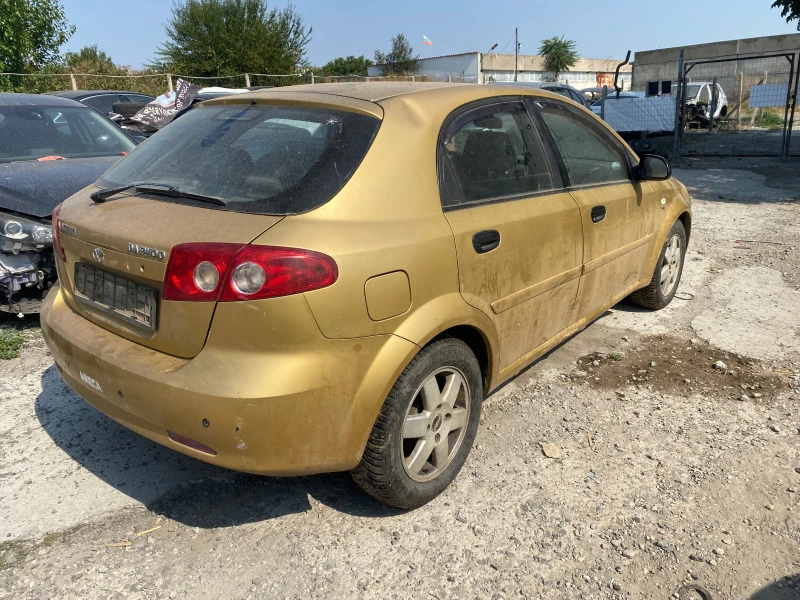 Daewoo Lacetti, снимка 5 - Автомобили и джипове - 46657578