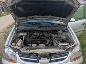 Nissan Almera tino, снимка 13