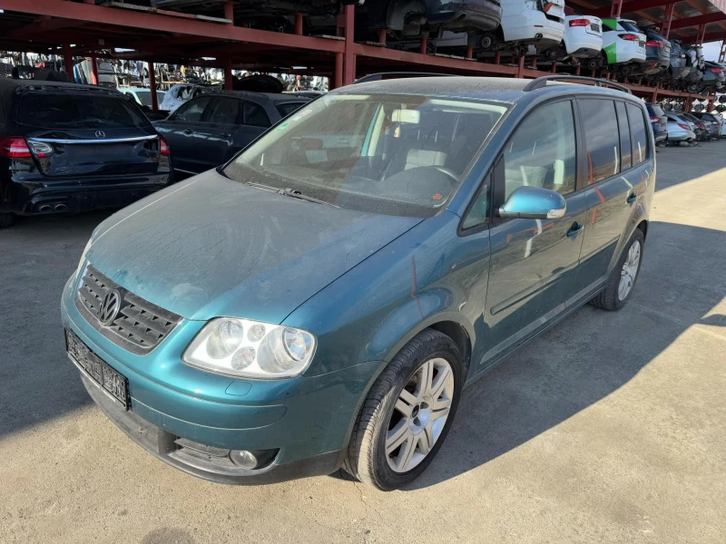 VW Touran 1.6, снимка 2 - Автомобили и джипове - 48130330