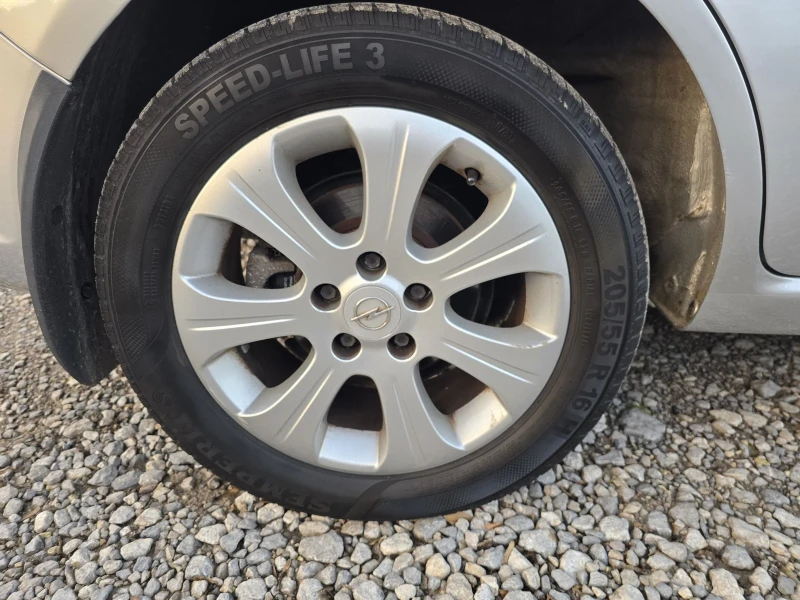 Opel Zafira 1.8i АВТОМАТ 7МЕСТА FACE, снимка 14 - Автомобили и джипове - 52568905