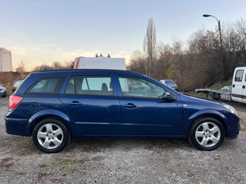 Opel Astra 2.0Turbo//Navi, снимка 7 - Автомобили и джипове - 48123182