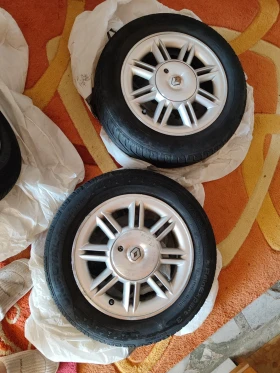 Гуми с джанти Uniroyal 175/65R14, снимка 6 - Гуми и джанти - 49243083