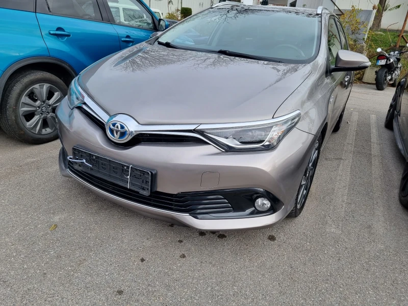 Toyota Auris Hybrid, снимка 9 - Автомобили и джипове - 47990249