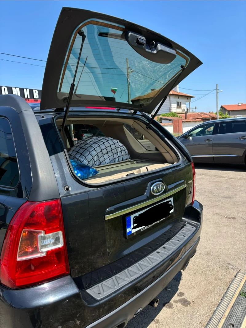 Kia Sportage, снимка 16 - Автомобили и джипове - 52311528