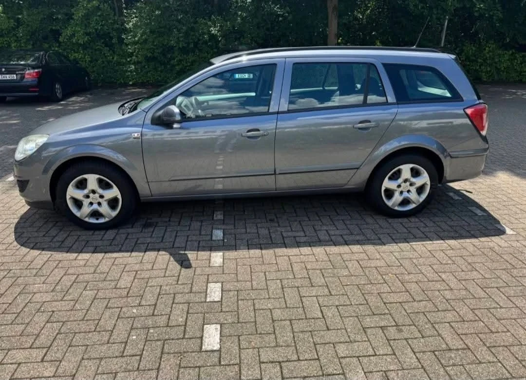 Opel Astra, снимка 8 - Автомобили и джипове - 55364602