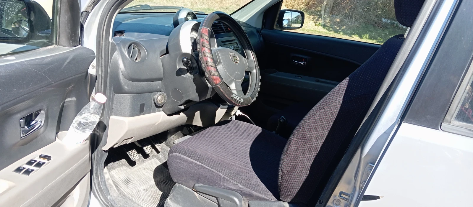 Daihatsu Sirion, снимка 12 - Автомобили и джипове - 56340610