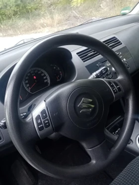 Suzuki Swift  Топ състояние, сервизна история!  - 3300 € / 6454.24 лв. - 42088435 13