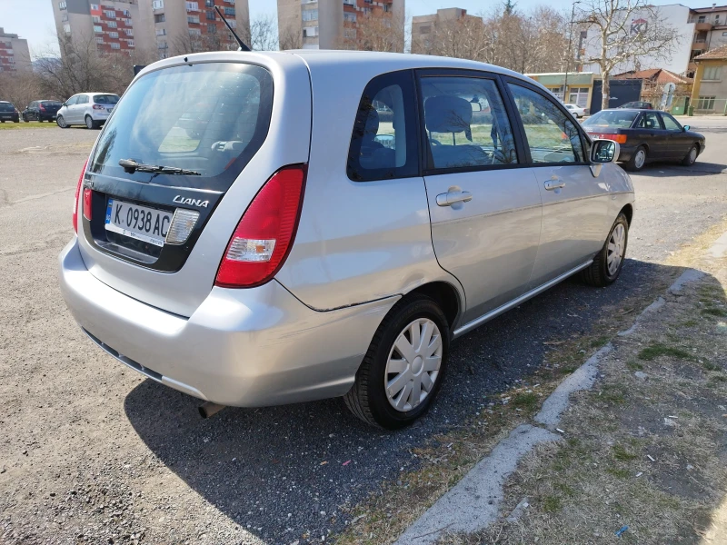 Suzuki Liana, снимка 7 - Автомобили и джипове - 49451367