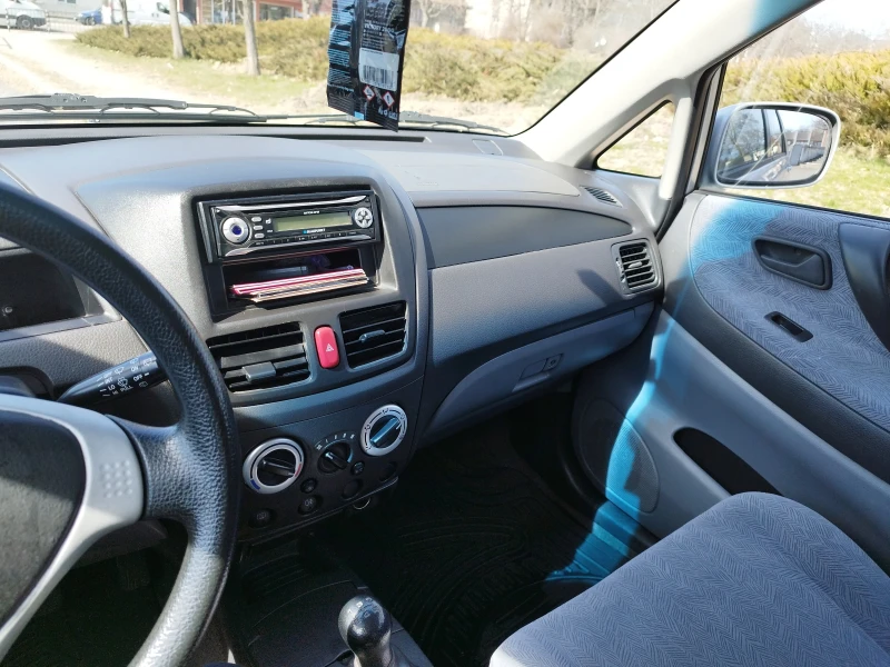 Suzuki Liana, снимка 13 - Автомобили и джипове - 49451367