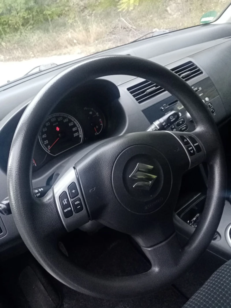 Suzuki Swift  Топ състояние, сервизна история! , снимка 13 - Автомобили и джипове - 53354384