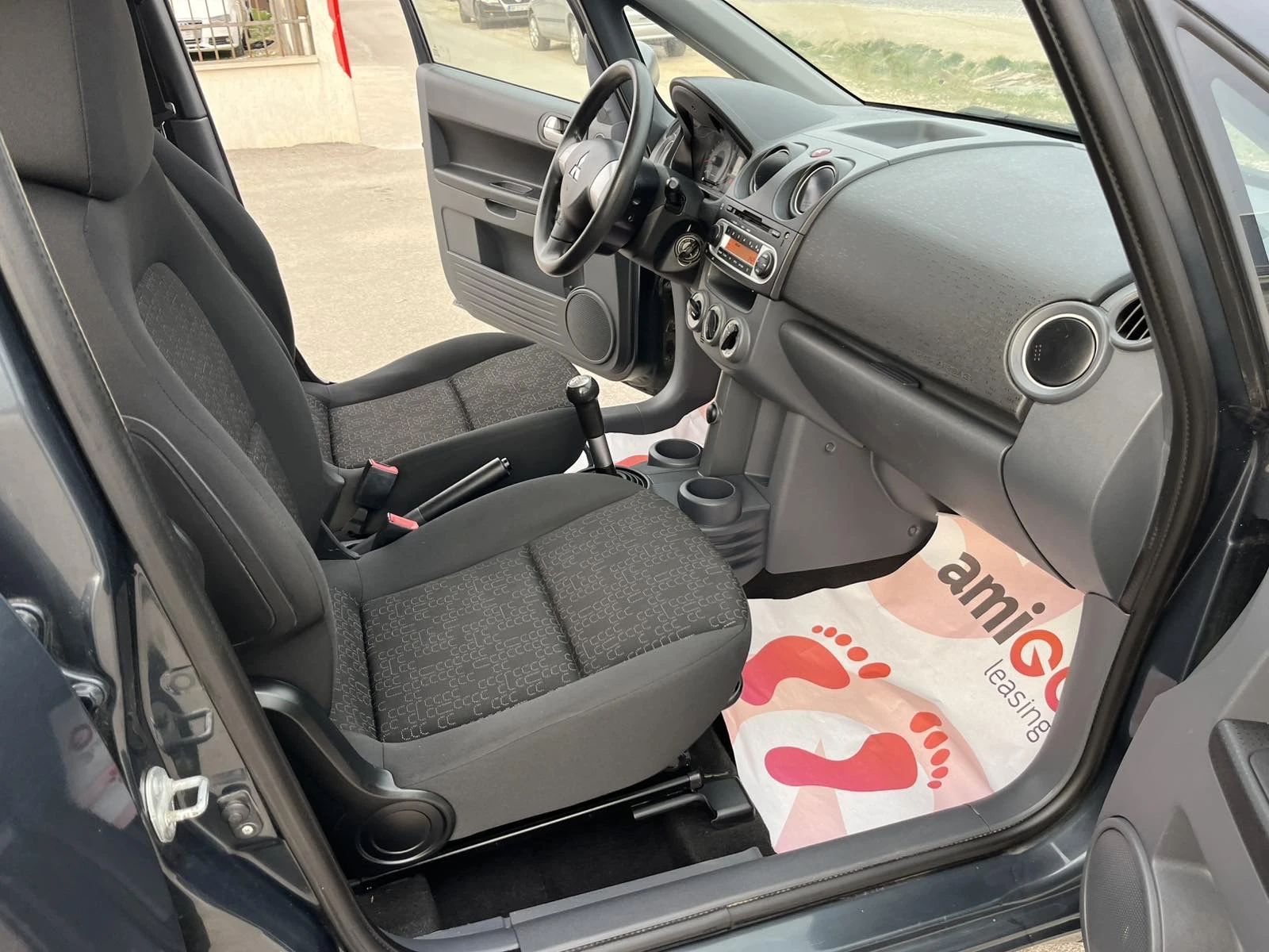 Mitsubishi Colt 1.2i 75кс EURO 4 КЛИМАТИК , снимка 11 - Автомобили и джипове - 53918229