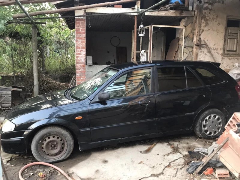 Mazda 323, снимка 1 - Автомобили и джипове - 46507851