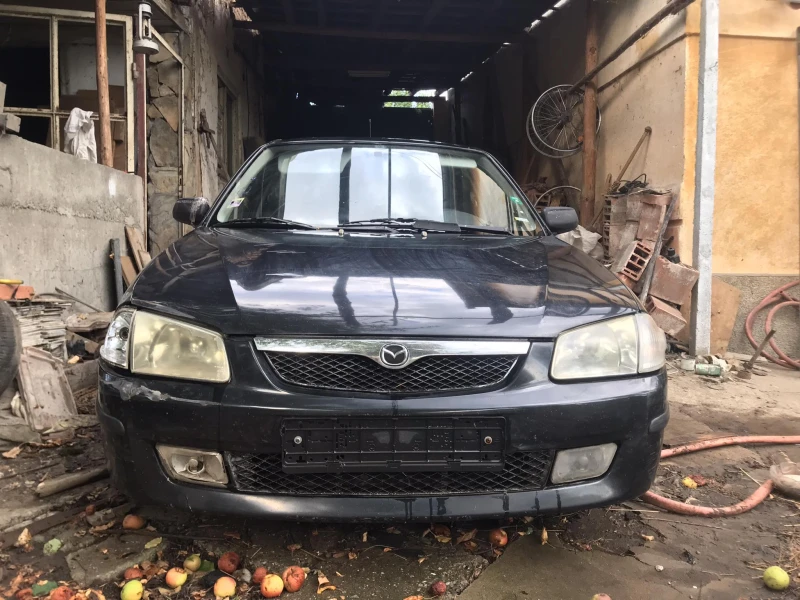 Mazda 323, снимка 7 - Автомобили и джипове - 46507851