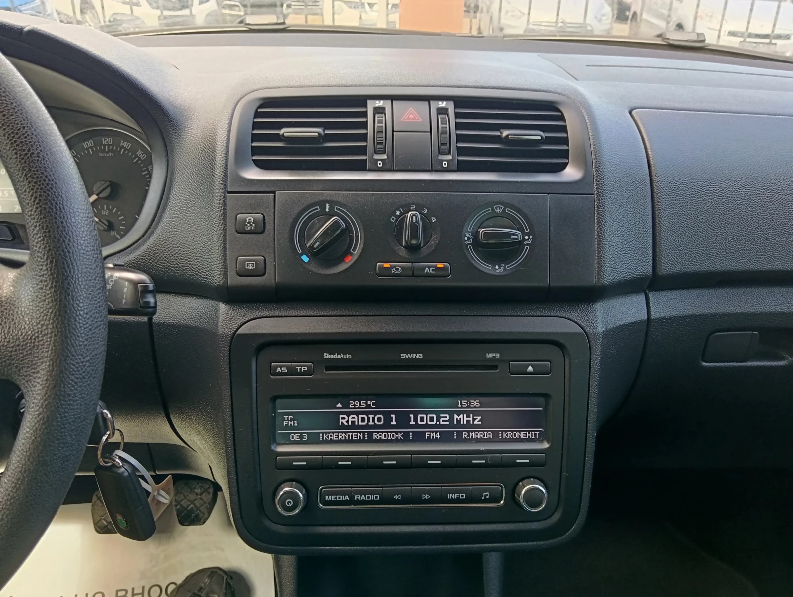 Skoda Roomster 1.2i, снимка 13 - Автомобили и джипове - 55050702