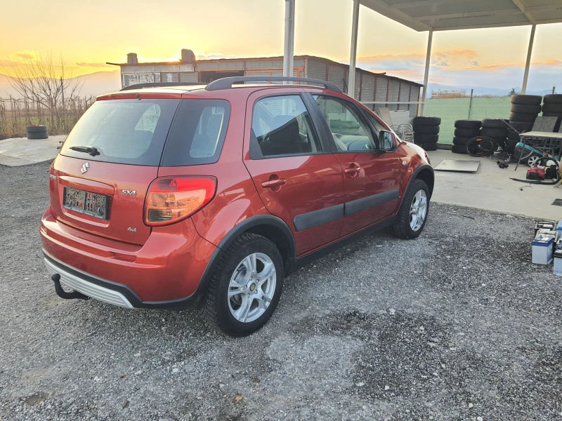 Suzuki SX4 1.6i 4x4, снимка 4 - Автомобили и джипове - 48329565