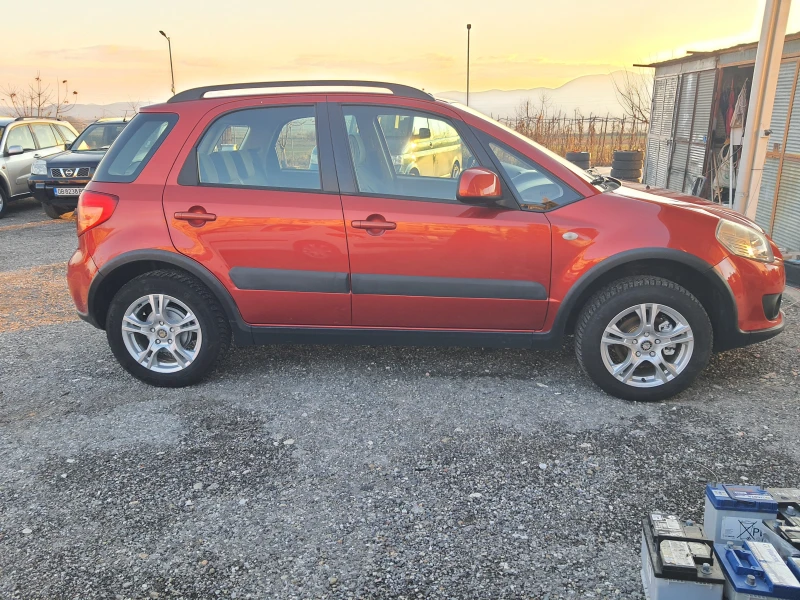 Suzuki SX4 1.6i 4x4, снимка 5 - Автомобили и джипове - 48329565