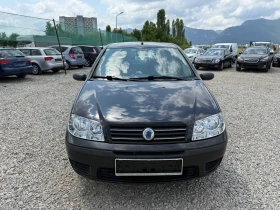 Fiat Punto 1.2i-60PS-КЛИМАТИК - 3200 лв. - 86148262 2