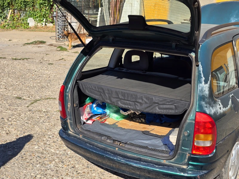 Opel Corsa 1.4 Комби, снимка 11 - Автомобили и джипове - 52326948