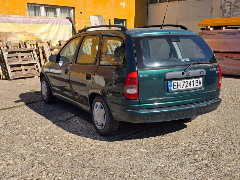 Opel Corsa 1.4 Комби, снимка 5 - Автомобили и джипове - 52326948