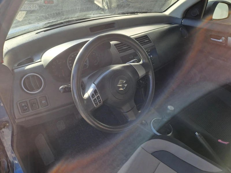 Suzuki Swift 1.3 GLA, снимка 10 - Автомобили и джипове - 52415200