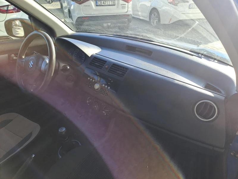 Suzuki Swift 1.3 GLA, снимка 14 - Автомобили и джипове - 52415200