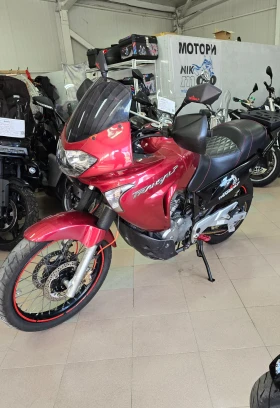 ������ Honda Xlv