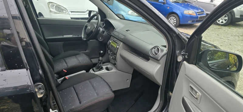 Mazda 2 1.4d, снимка 11 - Автомобили и джипове - 52379230