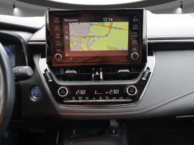 Toyota Corolla BI-TONE/2.0 HYBRID/КОЖ.САЛОН С ПОДГРЯВАНЕ/90хил.КМ | Auto.bg — изображение 11
