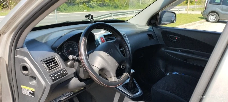 Hyundai Tucson, снимка 7 - Автомобили и джипове - 47457300