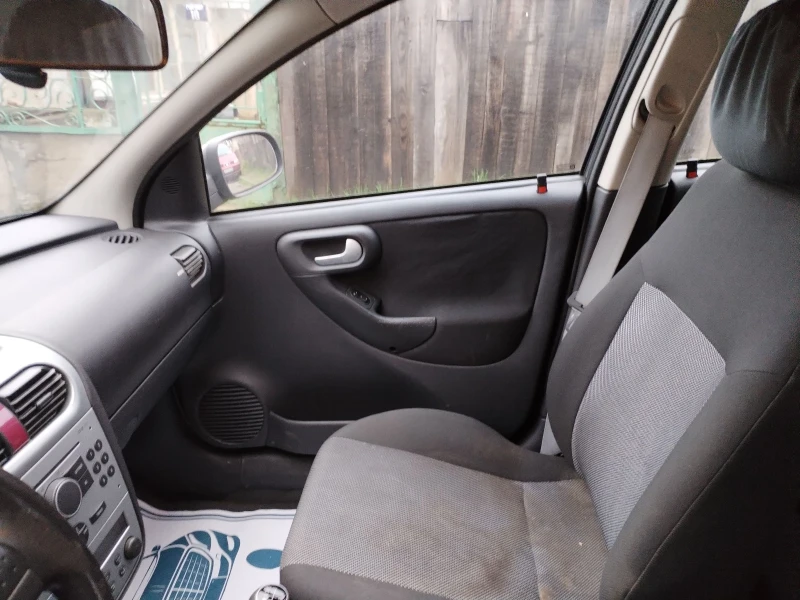 Opel Corsa 1.3CDTI, снимка 12 - Автомобили и джипове - 52633088