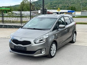 ������ Kia Carens