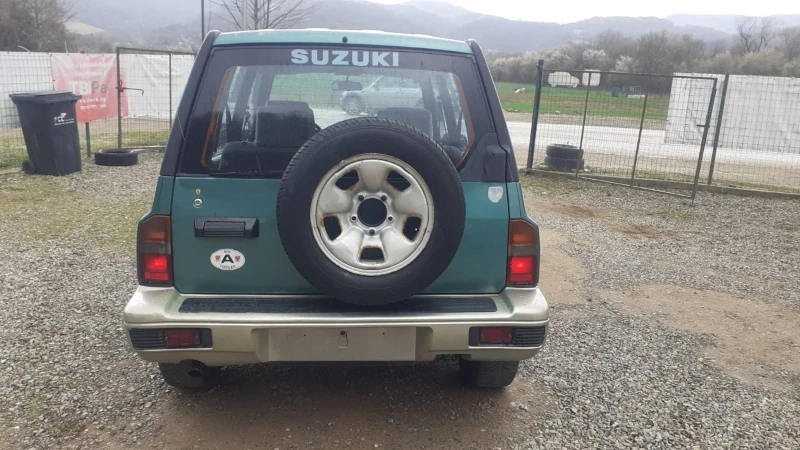 Suzuki Vitara 4+ 4 klimatik 1999г , снимка 7 - Автомобили и джипове - 49529287