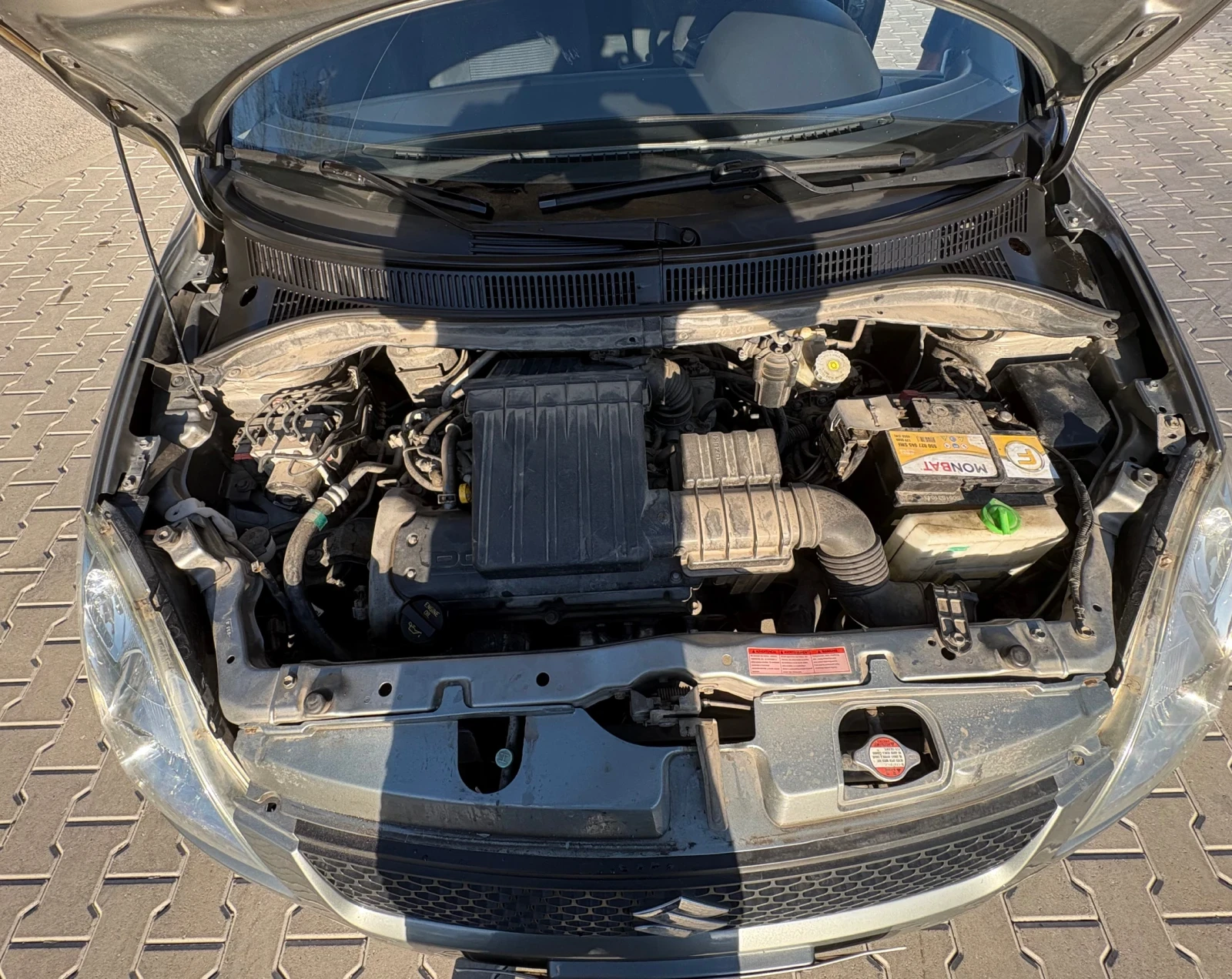 Suzuki Swift 1.3 бензин/газ , снимка 11 - Автомобили и джипове - 54456781
