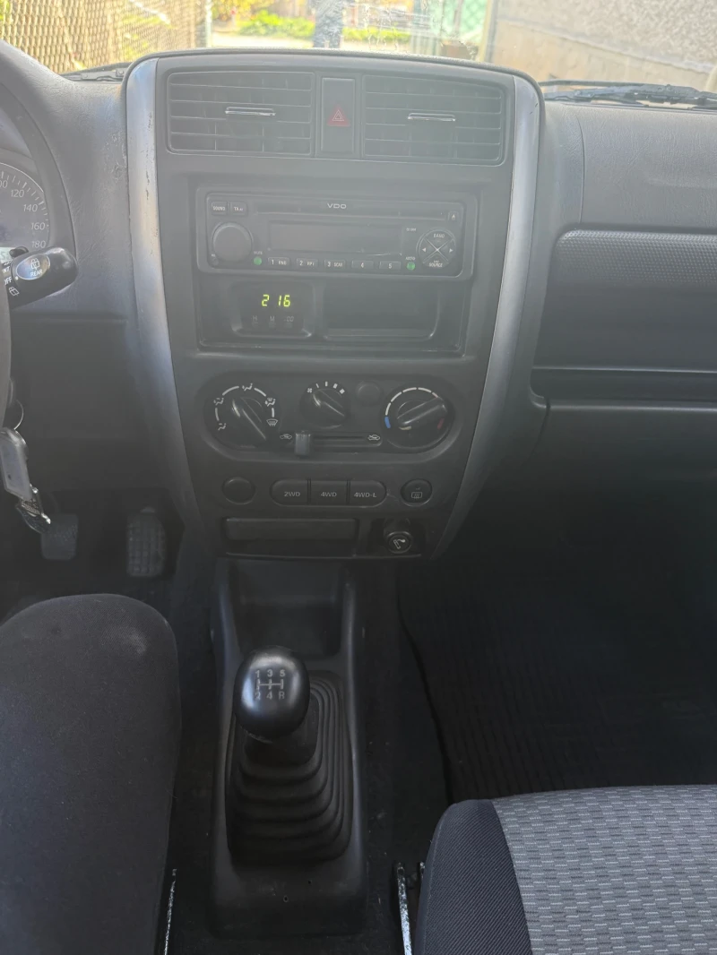 Suzuki Jimny, снимка 9 - Автомобили и джипове - 52502372