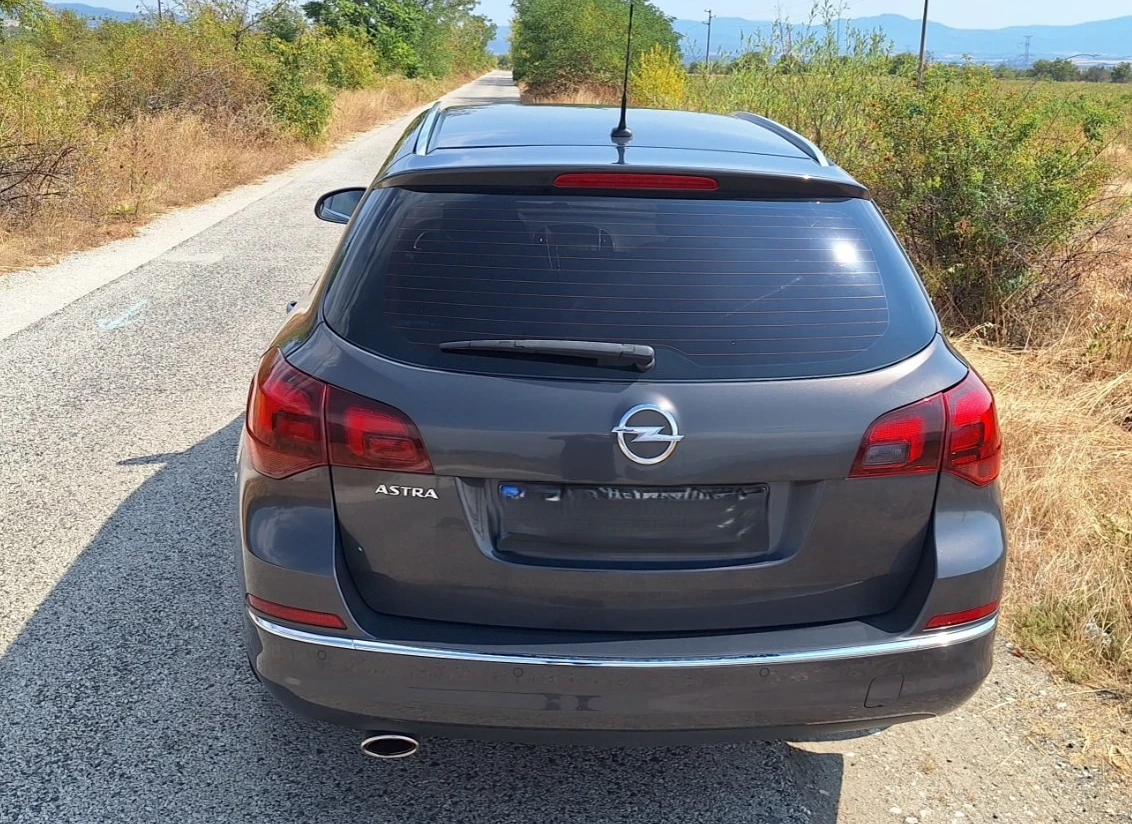 Opel Astra J, снимка 4 - Автомобили и джипове - 56041215