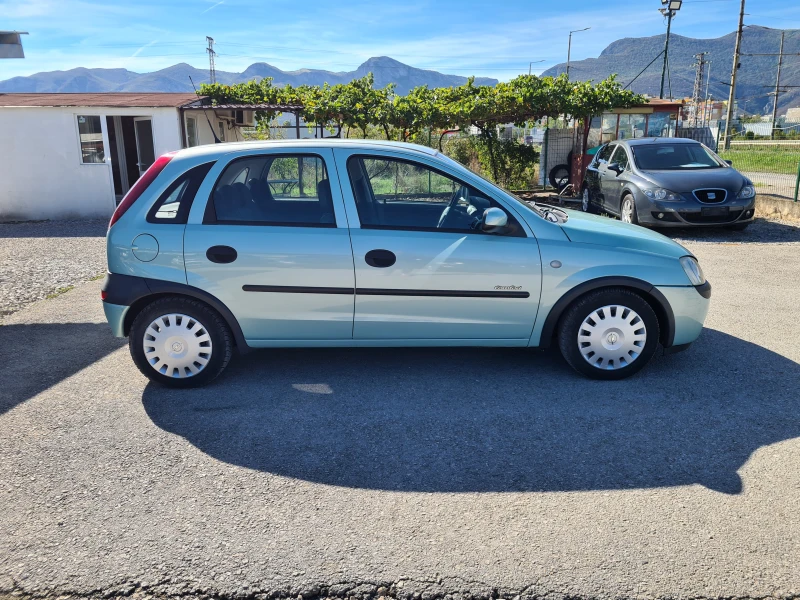 Opel Corsa 1.0 12V .147000km, снимка 4 - Автомобили и джипове - 47526648