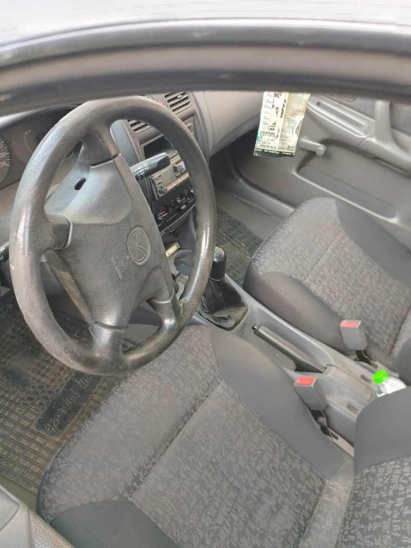 Mazda 323, снимка 1 - Автомобили и джипове - 48283647