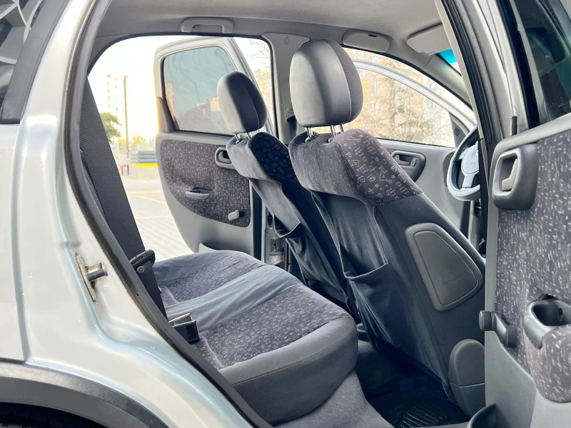 Opel Corsa 1.2i 75 к.с 2004г, снимка 13 - Автомобили и джипове - 52705376