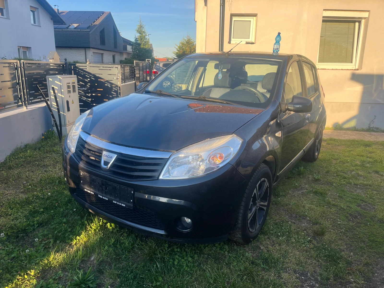 Dacia Sandero 1.4 MPI КЛИМАТИК , снимка 11 - Автомобили и джипове - 54648428