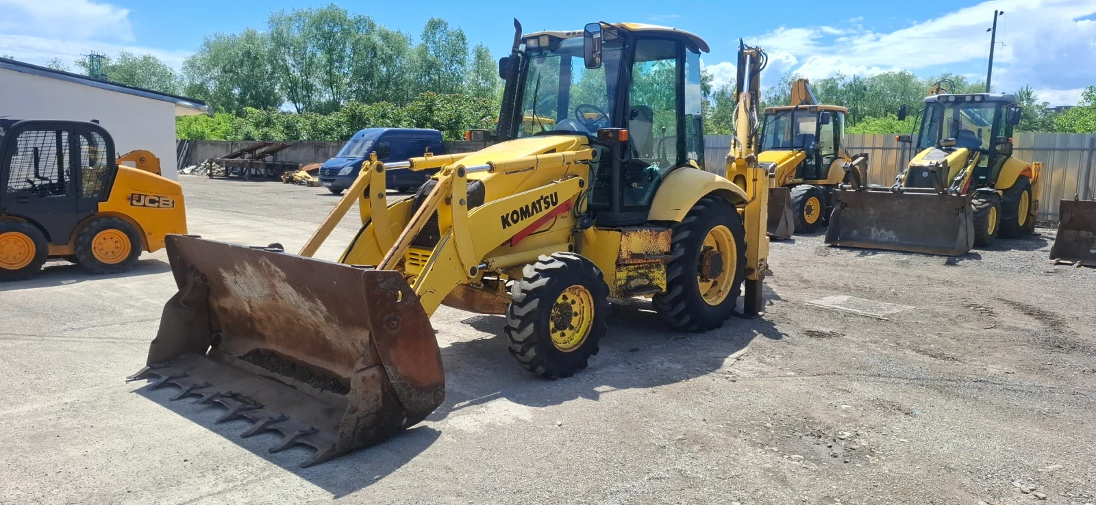 Багер Komatsu WB93R 