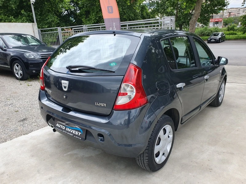 Dacia Sandero 1.4/75кс/АГУ, снимка 7 - Автомобили и джипове - 45715228